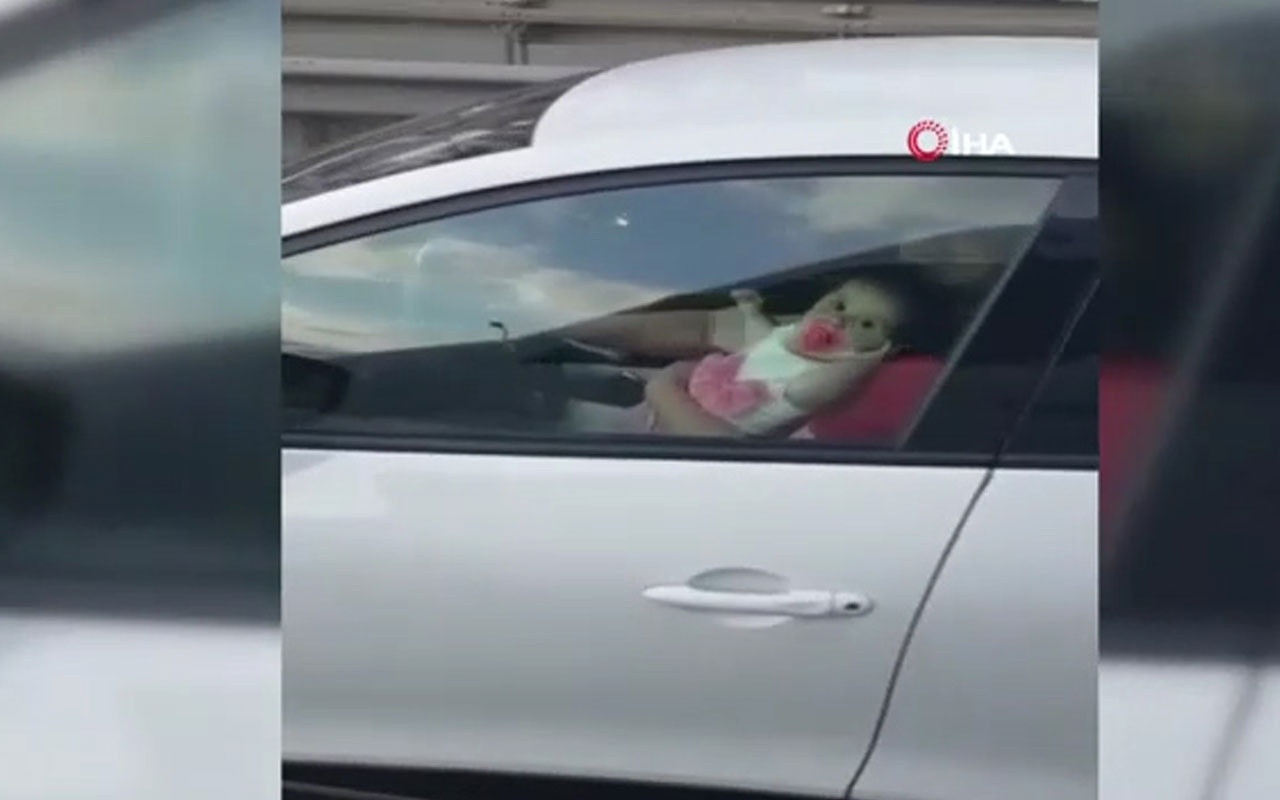 E5de şaşkına çeviren görüntü! Kucağında bebek ile