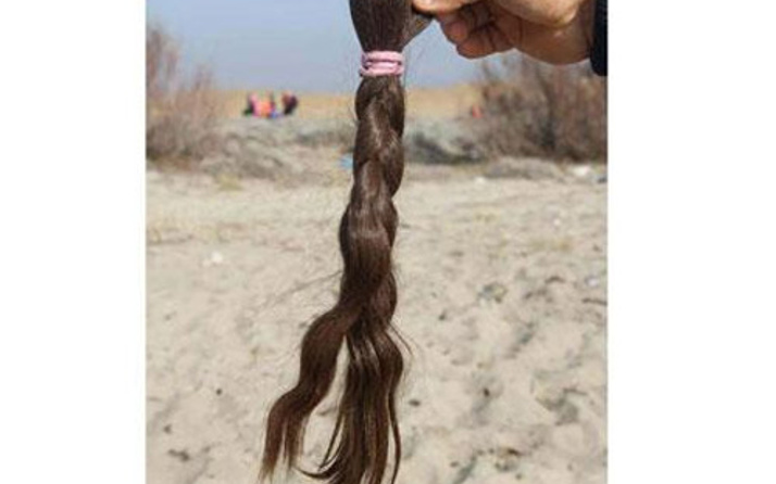 Saçı kesilen mülteci kız Aylan'dan sonraki en acı kare
