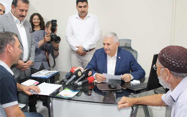 Başbakan Yıldırım vatandaşın imar barış kaydını yaptı