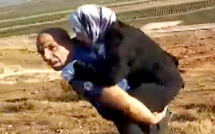 Yaralı Suriyeli kadını sırtında taşıyan polis o anları anlattı