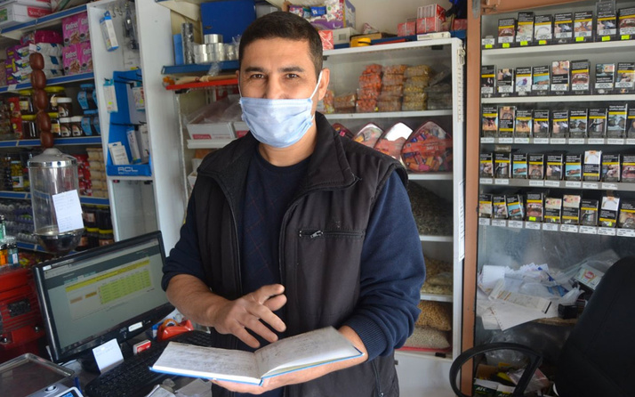 Adana'da hayırseveriş adamı veresiye defterindeki borçları kapattı