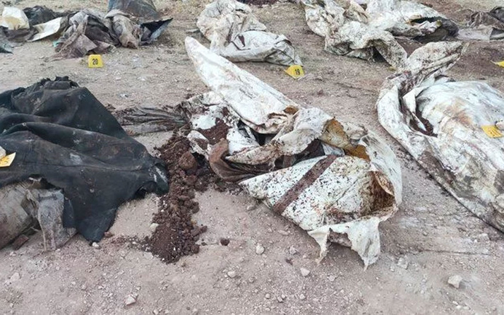 Afrin'de toplu mezar bulundu! PKK'nın 35 sivili katledip çuvallarla toplu mezara gömmüş