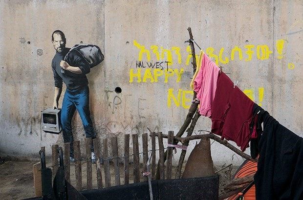 Banksy Apple'ın kurucusunu mülteci olarak çizdi