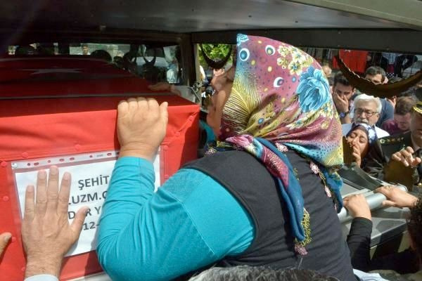 Şehit askerin eşi: Açın belki o değildir