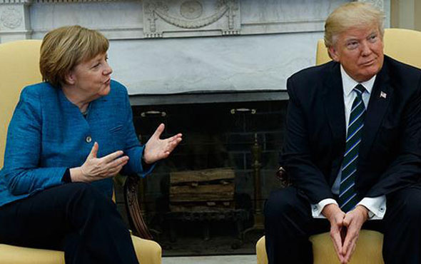 Trump Merkel’in elini sıkmadı