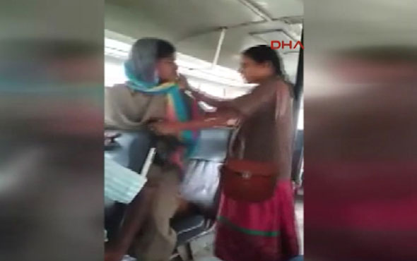 Otobüste yolcu ile kadın görevli arasındaki kavga kamerada