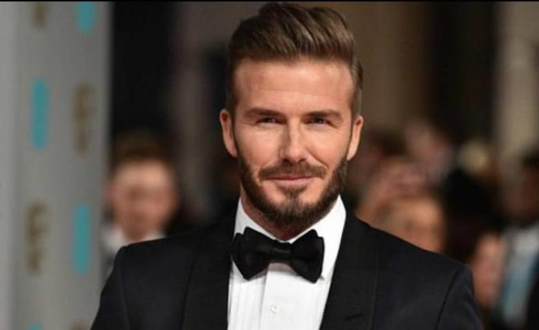 David Beckham’ı görünce göğüslerini açtı!