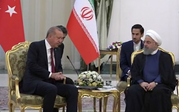 Üçlü zirve öncesi Erdoğan Ruhani ile görüştü