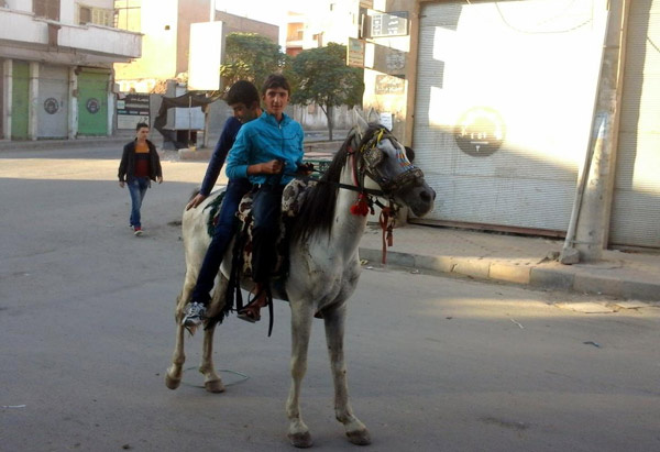 İşid'in başkentinden bayram fotoğrafları