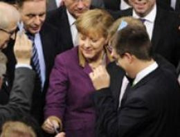 Merkel: Yunanistan'a yardım işe yaramayabilir