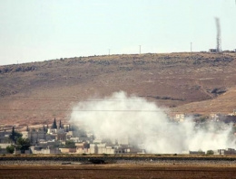 IŞİD Kobani'nin en önemli tepesine bayrak dikti