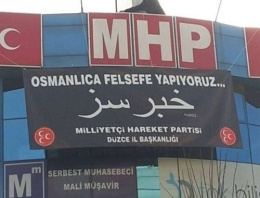 MHP'nin Osmanlıca pankartı elinde patladı!