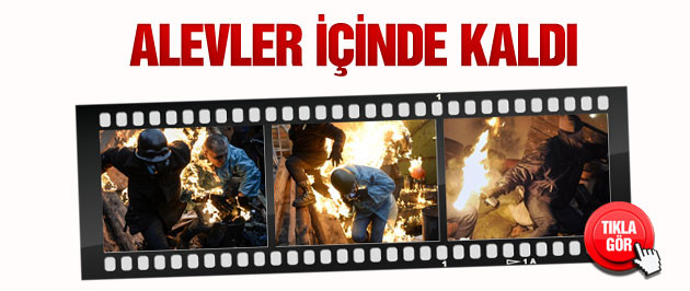 ukrayna'da bir gösterici alevler içinde kaldı.jpg