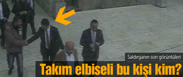orhan-övetin-mecliste-tokalaştiği-takim-elbiseli.jpg