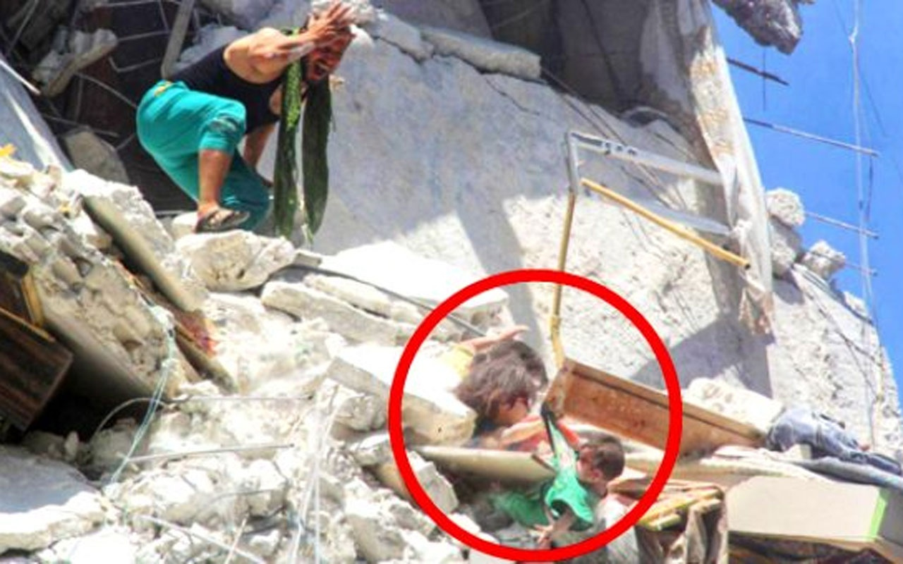 Suriye'de küçük kız çocuğunun kahramanlığı yürekleri sızlattı