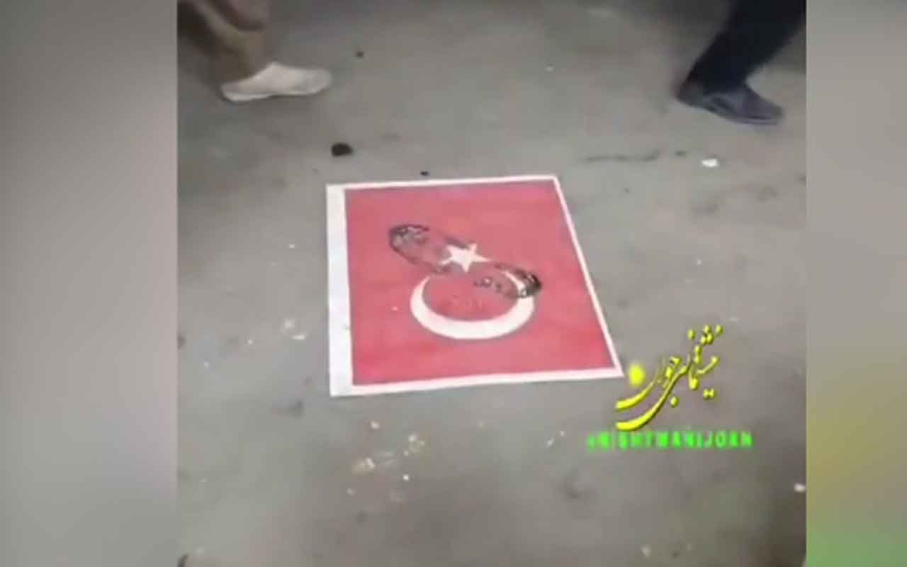 İran'da Türk bayrağına hakaret! Bayrağımıza yere koyup bastılar