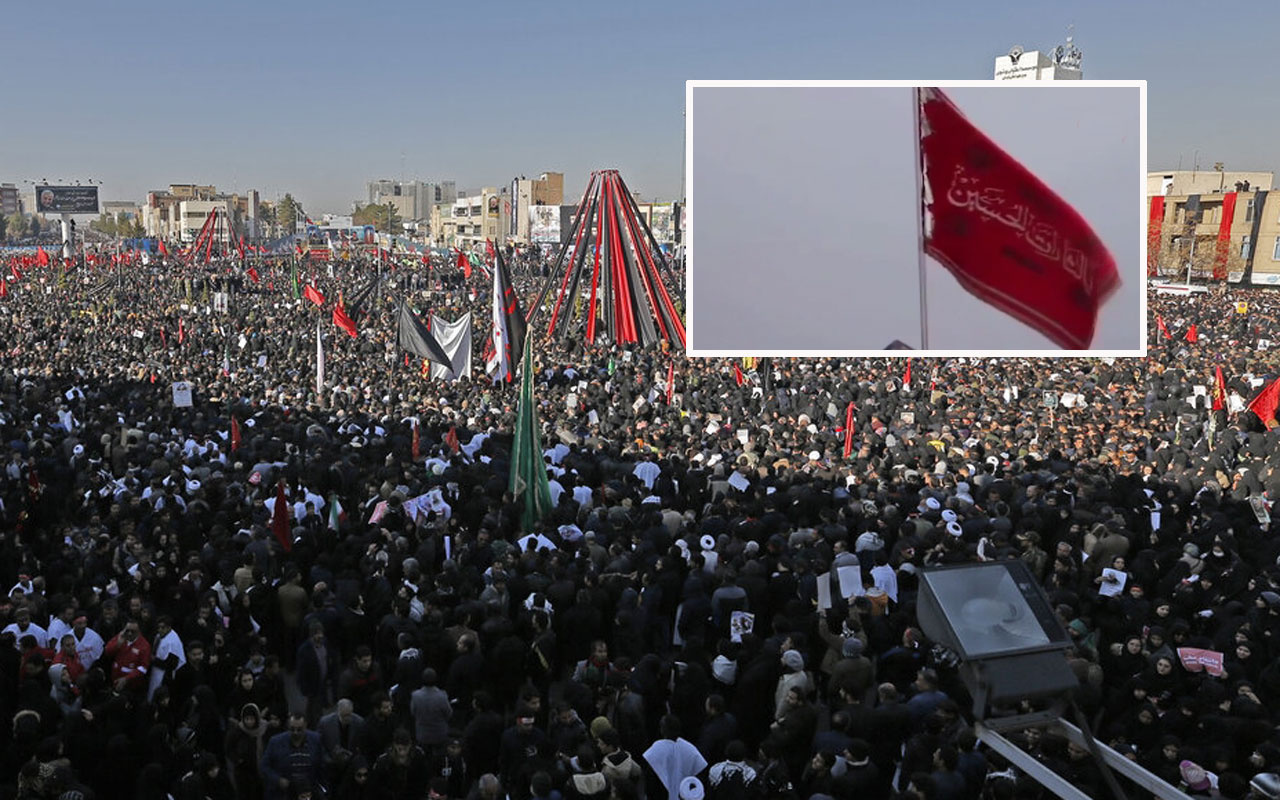 İran'ın Kum kemtinde göndere çekilen kırmızı renkli bayrağın anlamı konuşuluyor