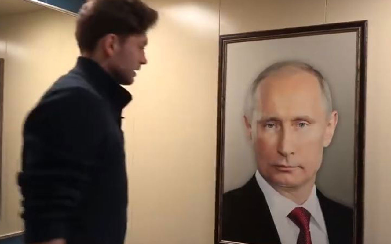 Rusya'da asansöre astıkları Putin fotoğrafıyla sosyal deney yaptılar