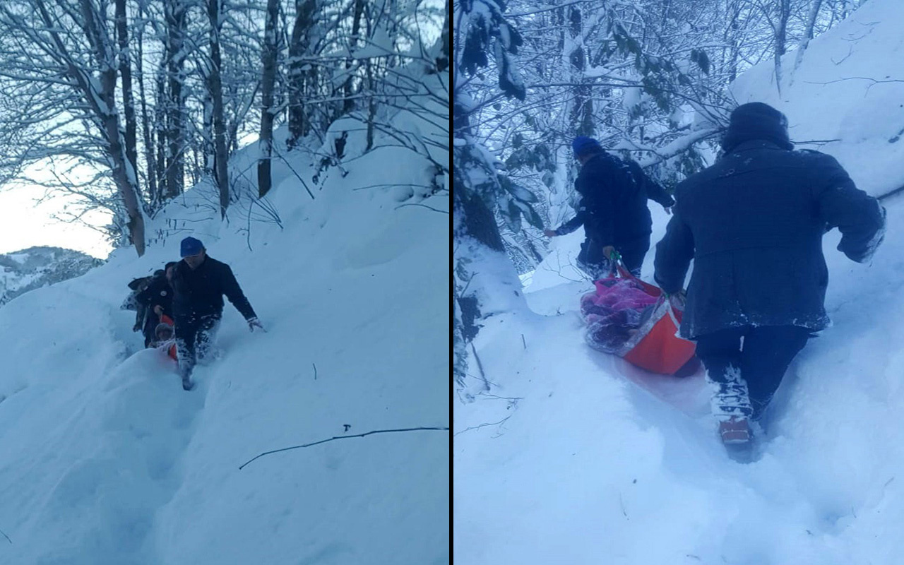 Rize'de karla kaplı yolda hastayı sedyeyle taşıdılar
