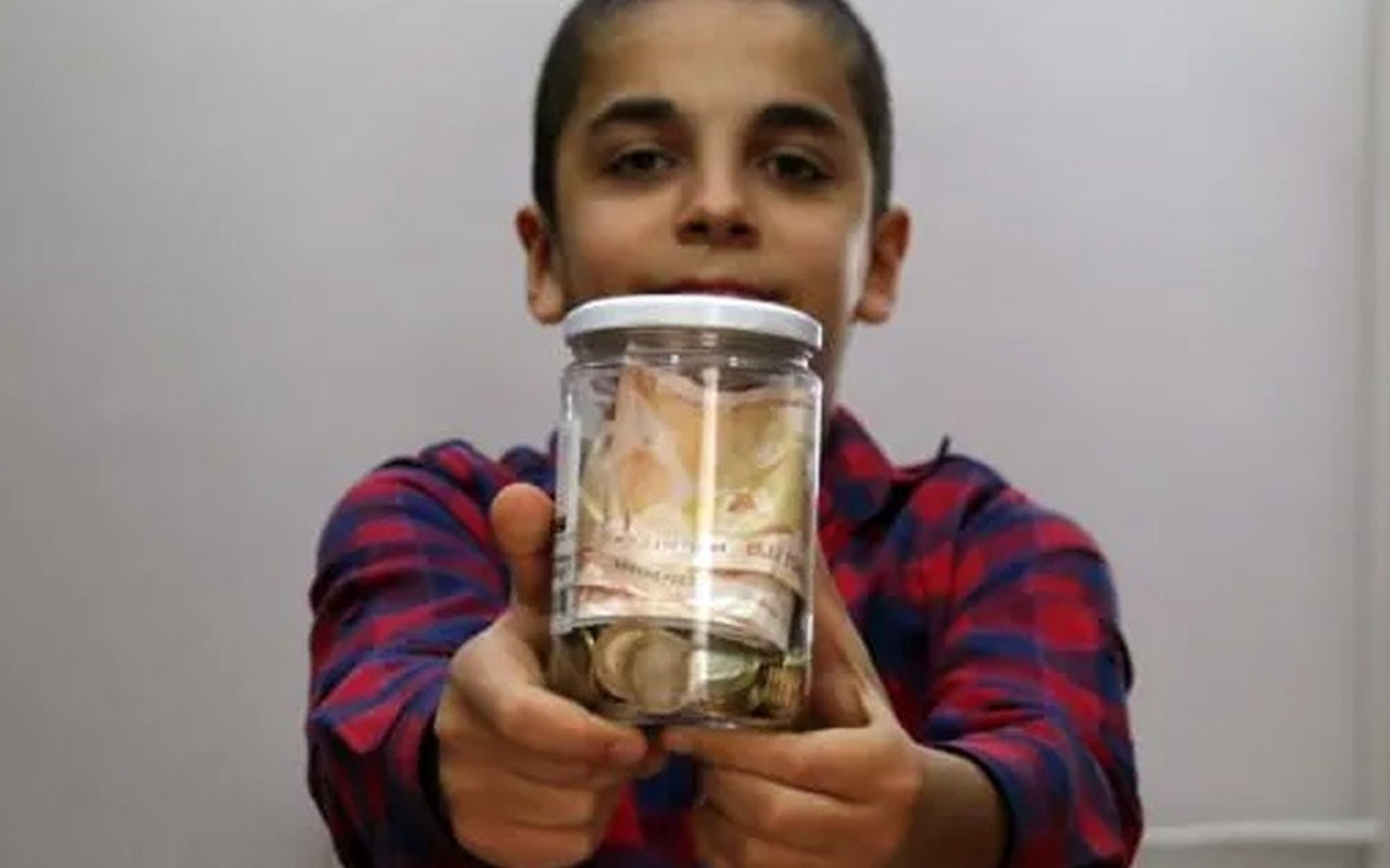 11 yaşındaki çocuk Milli Dayanışma Kampanyası'na kumbarasındaki 407 lirayı bağışladı