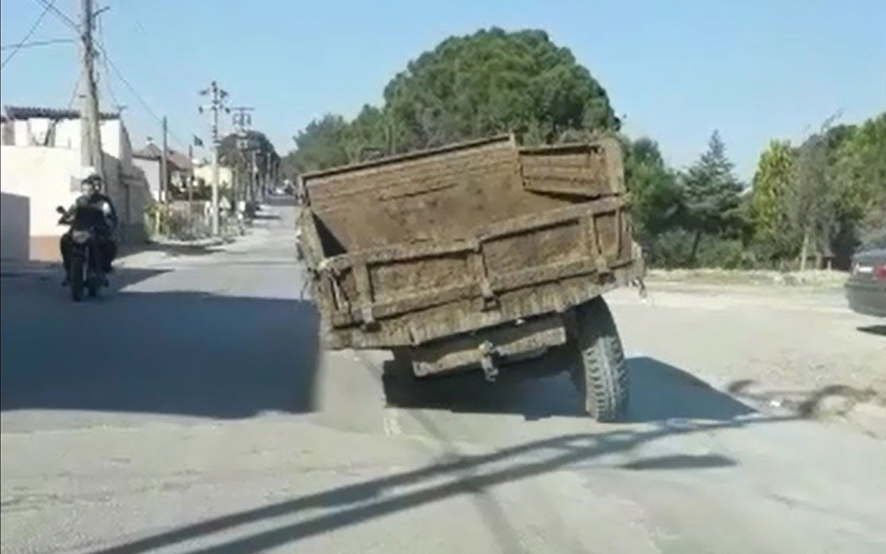 Trafikte dehlikeli anlar! Jant üzerinde seyreden traktör sürücü