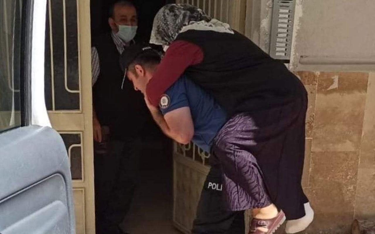 Hasta kadını polis sırtında taşıdı