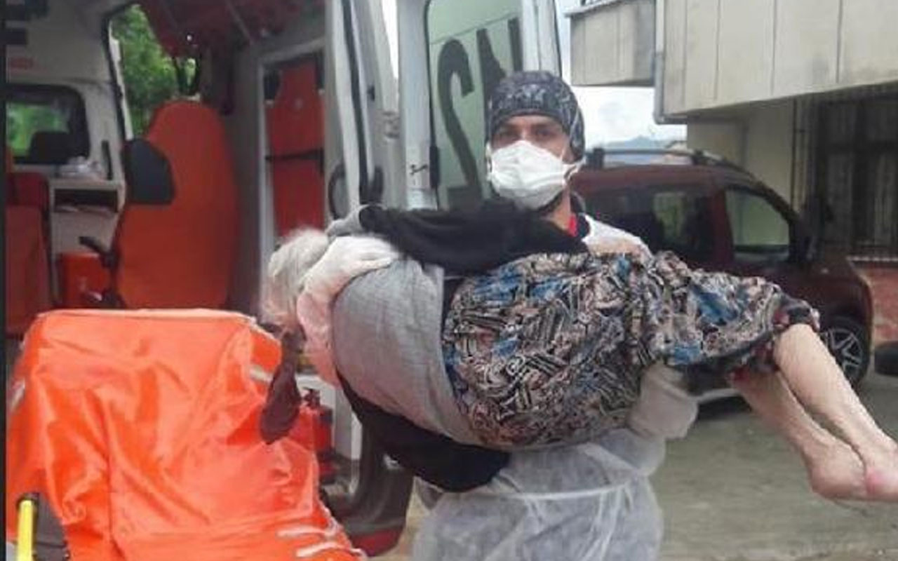 Rize'de sağlık çalışanı evinde karantinaya alınacak yaşlı kadını kucağında taşıdı