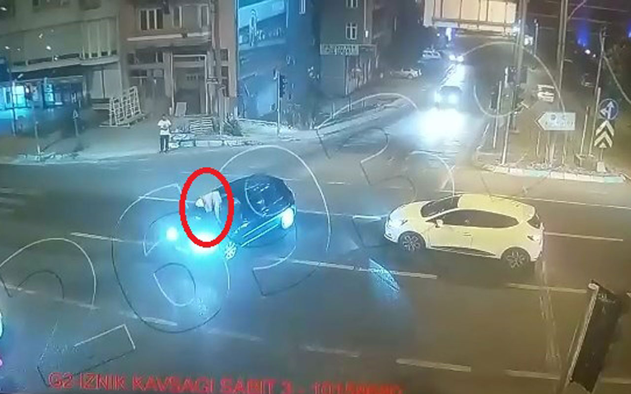 Bursa'da otomobilinin üzerine çıkan saldırganı polis merkezine kaputta götürdü