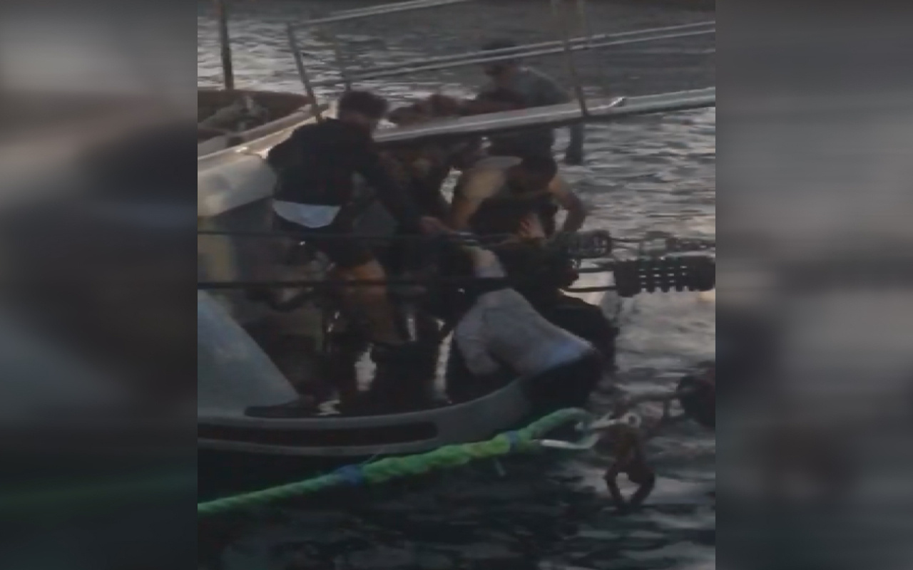 İstanbul Beşiktaş'ta denize düşen turistleri teknedeki kişi kurtardı