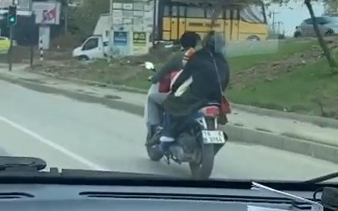 Bursa'da pes dedirten görüntü! 4 kişi motosiklete bindi yürekler ağza geldi