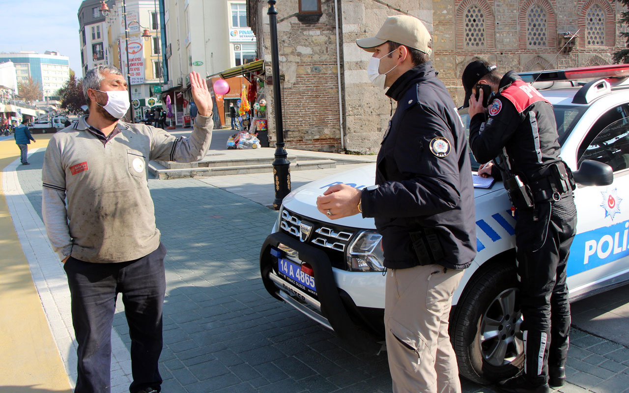 Maskesini takmadı kendisine ceza kesen polisle tartıştı