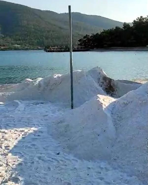 5 yıldızlı otele ceza yağmıştı! Bodrum'da plaja dökülen kuvars tozu kaldırılmaya başlandı