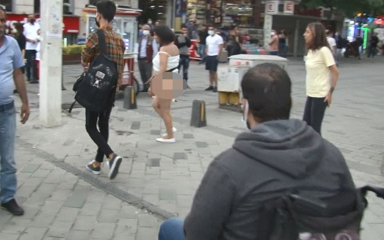 İstanbul Taksim Meydanı'nda Faslı kadın soyundu! Gözaltı için iğrençlik yaptı