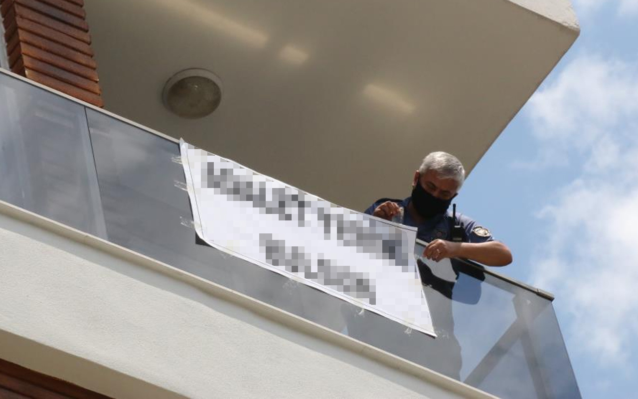 Kendini eve kilitledi balkona astığı yazı şaşırttı! Antalya'da gören telefona sarıldı