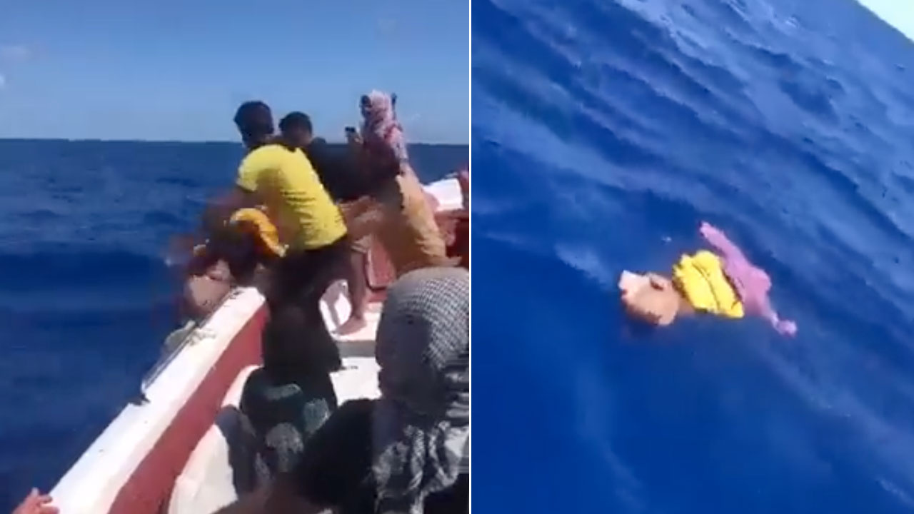 Susuzluktan ölen bebeğini denize attı! Mülteci dramı kamerada