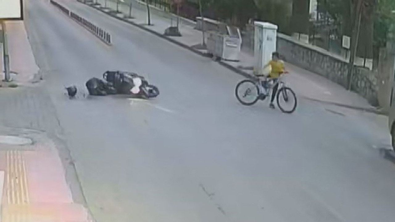 Motosikletli genç, bisikletli çocuğa çarpmamak için kendini feda etti